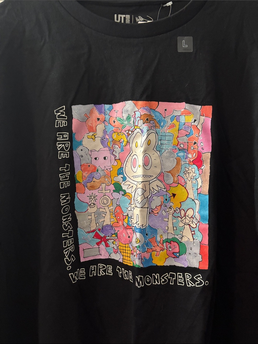 Limited Edition UNIQLO &
KASING women’s black Tee